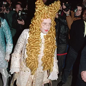 Elton John attends his 47th birthday party. 26th March 1994