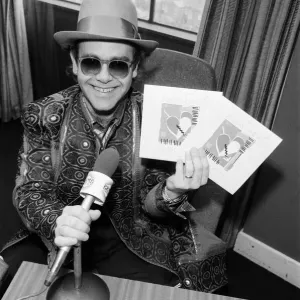 Elton John at BRMB Radio Aston, Birmingham. The visit was to promote his latest single Elton John at BRMB Radio Aston, Birmingham. The visit was to promote his latest single