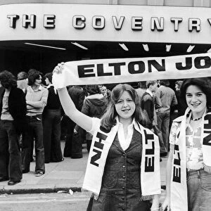 Elton John fans pose outside the Coventry Theatre before his concert 27th May 1976
