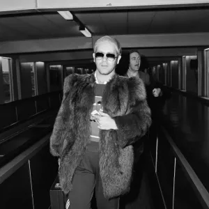 Elton John, flies off to Toronto, Canada from Heathrow Airport, London