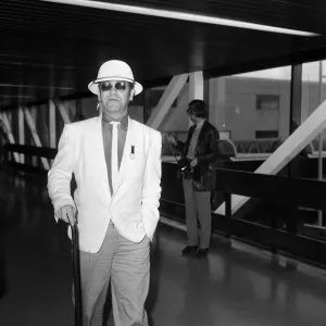 Elton John Print at Heathrow Airport, 6th August 1983 Elton John Print at Heathrow Airport, 6th August 1983