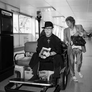 Elton John at Heathrow Airport Print, 7th September 1987