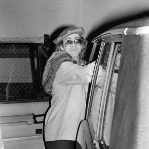 Elton John leaving the Empire Pool Wembley by the back door after he announced his