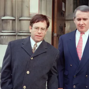 Elton John and John Reid at High Court Libel Case Print, 4th November 1993 Elton John and John Reid at High Court Libel Case Print, 4th November 1993
