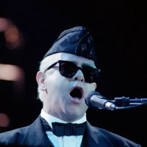 Elton John performing in concert in Paris during his Reg Strikes Back Tour Elton John performing in concert in Paris during his Reg Strikes Back Tour