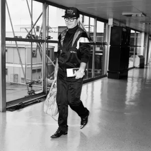 Elton John pictured at London Airport. 19th June 1987 Elton John pictured at London Airport. 19th June 1987