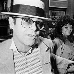 Elton John and his wife Renate arrive at the Comedy Theatre. 14th June 1984
