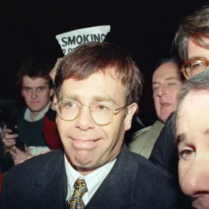 Elton John wins a £350, 000 libel victory against the Sunday Mirror Elton John wins a £350, 000 libel victory against the Sunday Mirror