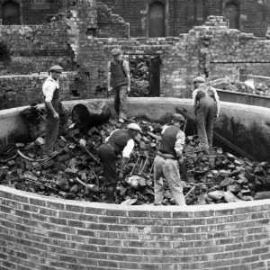 An Emergency Water Supply dam, which people have filled with debris such as bedsteads