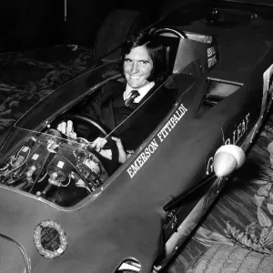 Emerson Fittipaldi formua one racing driver sits in Lotus Emerson Fittipaldi formua one racing driver sits in Lotus