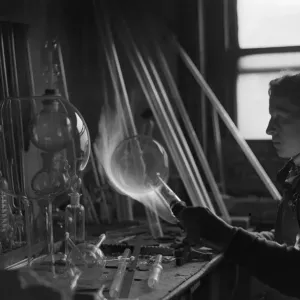A employee of Scientific Supplies of Hatton Garden, seen here glass blowing A employee of Scientific Supplies of Hatton Garden, seen here glass blowing