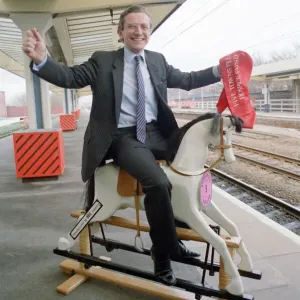 Employment Secretary, Norman Fowler, on a rocking horse Employment Secretary, Norman Fowler, on a rocking horse