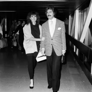 Engelbert Humperdinck and his daughter Louise, 18, arrive at Heathrow for a family
