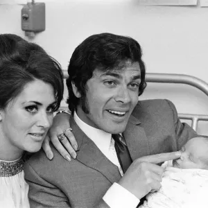 Print of Engelbert Humperdinck and wife Pat with newborn son at Queen Charlotte's Hospital Print of Engelbert Humperdinck and wife Pat with newborn son at Queen Charlotte's Hospital