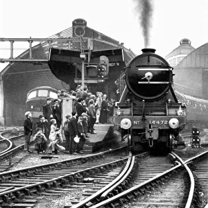 Engine No. 4472 The Flying Scotsman leaving an admiring audience