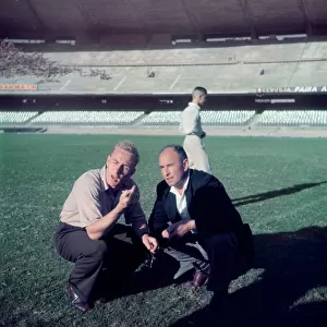 England captain Billy Wright inspects the pitch at the newly opened Maracana Stadium in