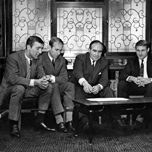 England football manager Alf Ramsey discusses tactics with England players Peter Thompson