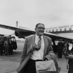 The England football squad return to London airport after being knocked out of the World The England football squad return to London airport after being knocked out of the World