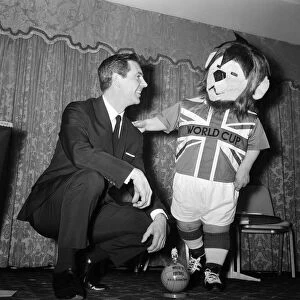 Former England footballer Johnny Haynes pictured with World Cup Willie