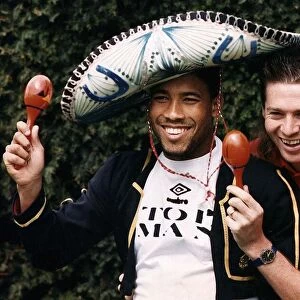 England footballers John Barnes and Chris Waddle take a break during an England training