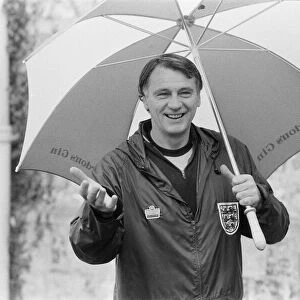 England manager Bobby Robson underneath an umbrella during an England training session at