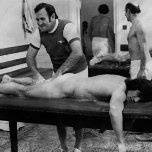 England manager Don Revie massages the thigh of a naked Kevin Keegan