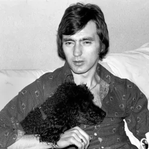 England and Stoke international hero Alan Hudson seen here with his pet poodle England and Stoke international hero Alan Hudson seen here with his pet poodle