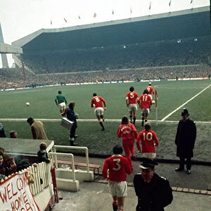 English FA Cup match at Old Trafford The United team walk onto the pitch at Old