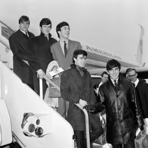 The English pop rock group, Dave Clark Five at an airport leaving for America