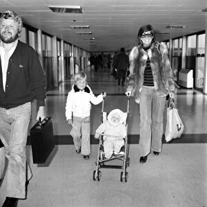 Entertainer Cilla Black seen here at Heathrow Airport with her husband and children