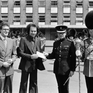 Neil Diamond presents cheque to Grenadier Guards at Chelsea Barracks Print Neil Diamond presents cheque to Grenadier Guards at Chelsea Barracks Print