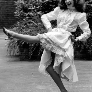 Entertainment: Dancing: A woman poses as she dances the Can-Can. July 1981 81-03766-007