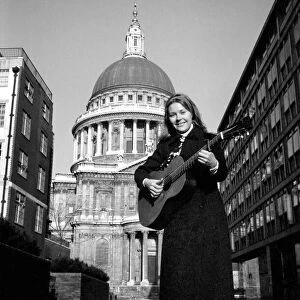 Entertainment: Music. Folk singer Suzanne Harris sang to a lunch time audience in St