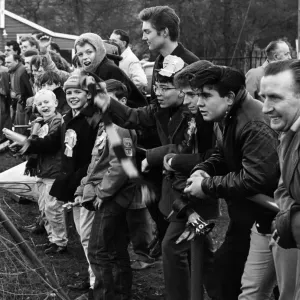 Enthusiastic Alvechurch supporters watch their team in action in a cup match against Enthusiastic Alvechurch supporters watch their team in action in a cup match against