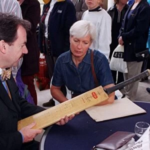 Eric Knowles Antiques Expert October 98 Looking at a cricket bat on The Antiques