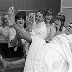 Eric Morecambe and Ernie Wise June 1965 clown it up with chorus girls in
