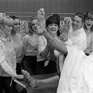 Eric Morecambe and Ernie Wise June 1965 clown it up with chorus girls in
