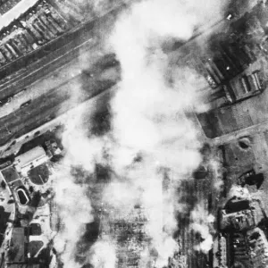 Print of the Erla Aircraft Factory in Flames, Antwerp, 1943