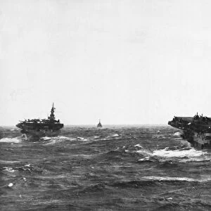 Two of the escort carriers, HMS Slinger (left) and HMS Speaker taking a tossing with