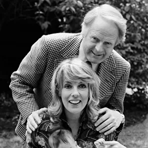 Esther Rantzen at home with her baby daughter Emily and husband Desmond Wilcox