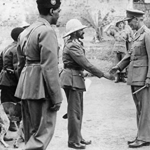 Ethiopian Emperor Haile Selassie is greeted by Lieutenant General Cunningham