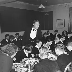 Eton School in Windsor Circa 1950s Pupils in the dinning hall eating dinner