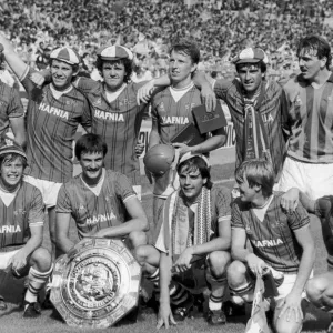Everton football team pose with the Charity Shield trophy after their 1-0 victory over Everton football team pose with the Charity Shield trophy after their 1-0 victory over