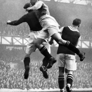 Everton footballer Dixie Dean in action for his team during a league match aginst Aston