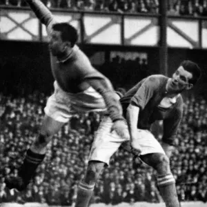 Everton footballer Dixie Dean in action for his team during a league match at Goodison