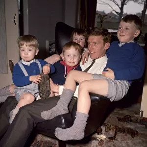 Everton footballer Tony Kay with his children at home after his release from prison