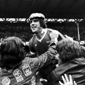 Everton forward Bob Latchford mobbed by jubilant fans after scoring his 30th goal of Everton forward Bob Latchford mobbed by jubilant fans after scoring his 30th goal of