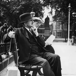An ex serviceman of the last war sitting in Parliament Square with his gas mask An ex serviceman of the last war sitting in Parliament Square with his gas mask