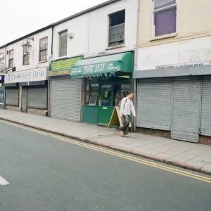 Examples of shuttered and non-shuttered shops on Far Gosford Street Examples of shuttered and non-shuttered shops on Far Gosford Street