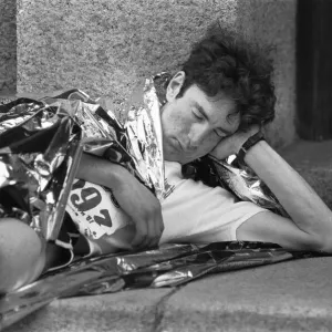 Exhausted marathon runner tries to get 40 winks after completing the race 10th May 1987 Exhausted marathon runner tries to get 40 winks after completing the race 10th May 1987